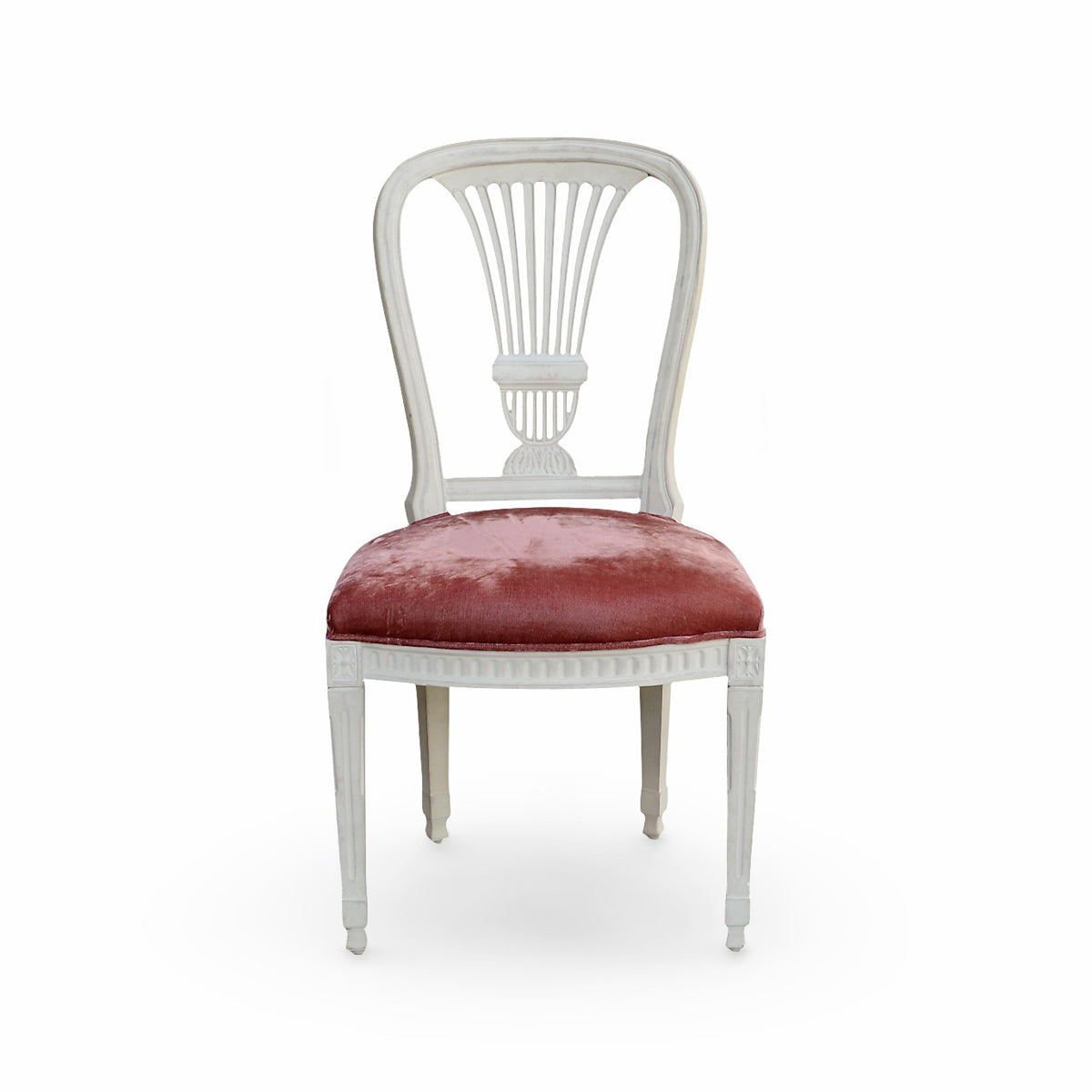 Side chair with a carved birch frame and crushed velvet seat