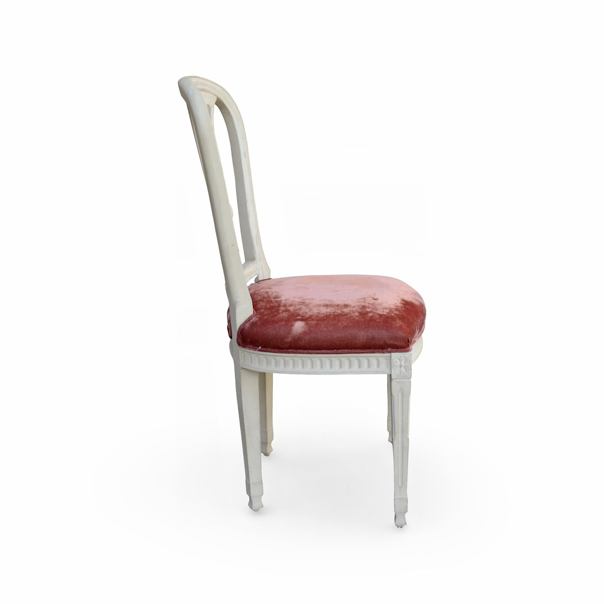 Side chair with a carved birch frame and crushed velvet seat