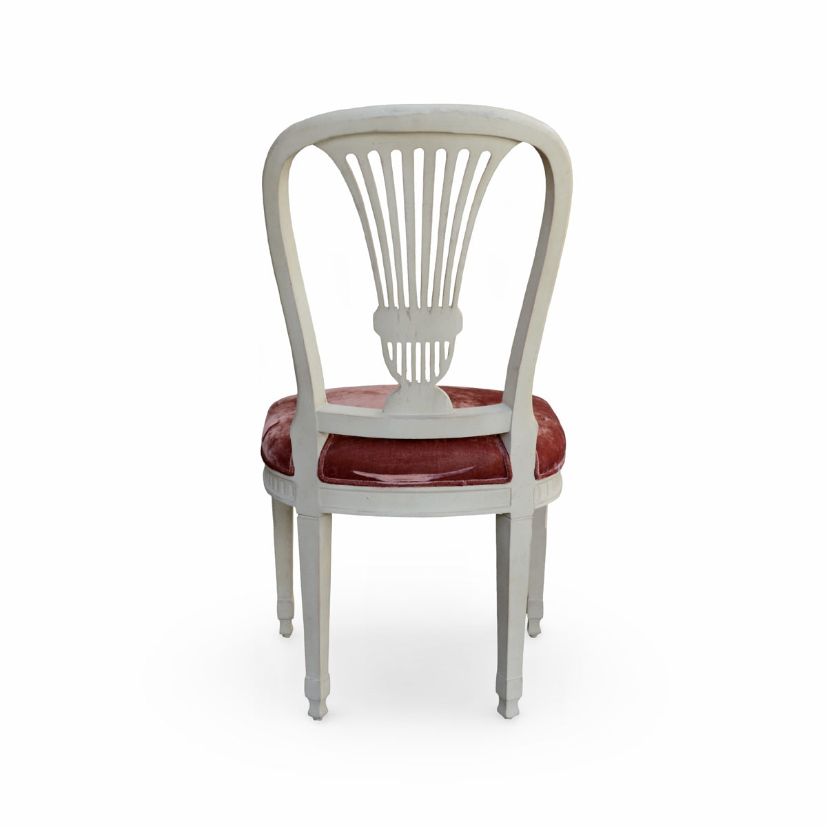 Side chair with a carved birch frame and crushed velvet seat