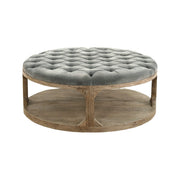 Round tufted velvet ottoman on a solid pine base.