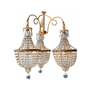 Eddie chandelier with branching arms and three faceted glass light assemblies