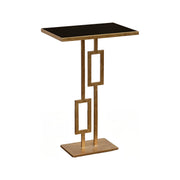 Side table with black marble top on a slender architectural metal base