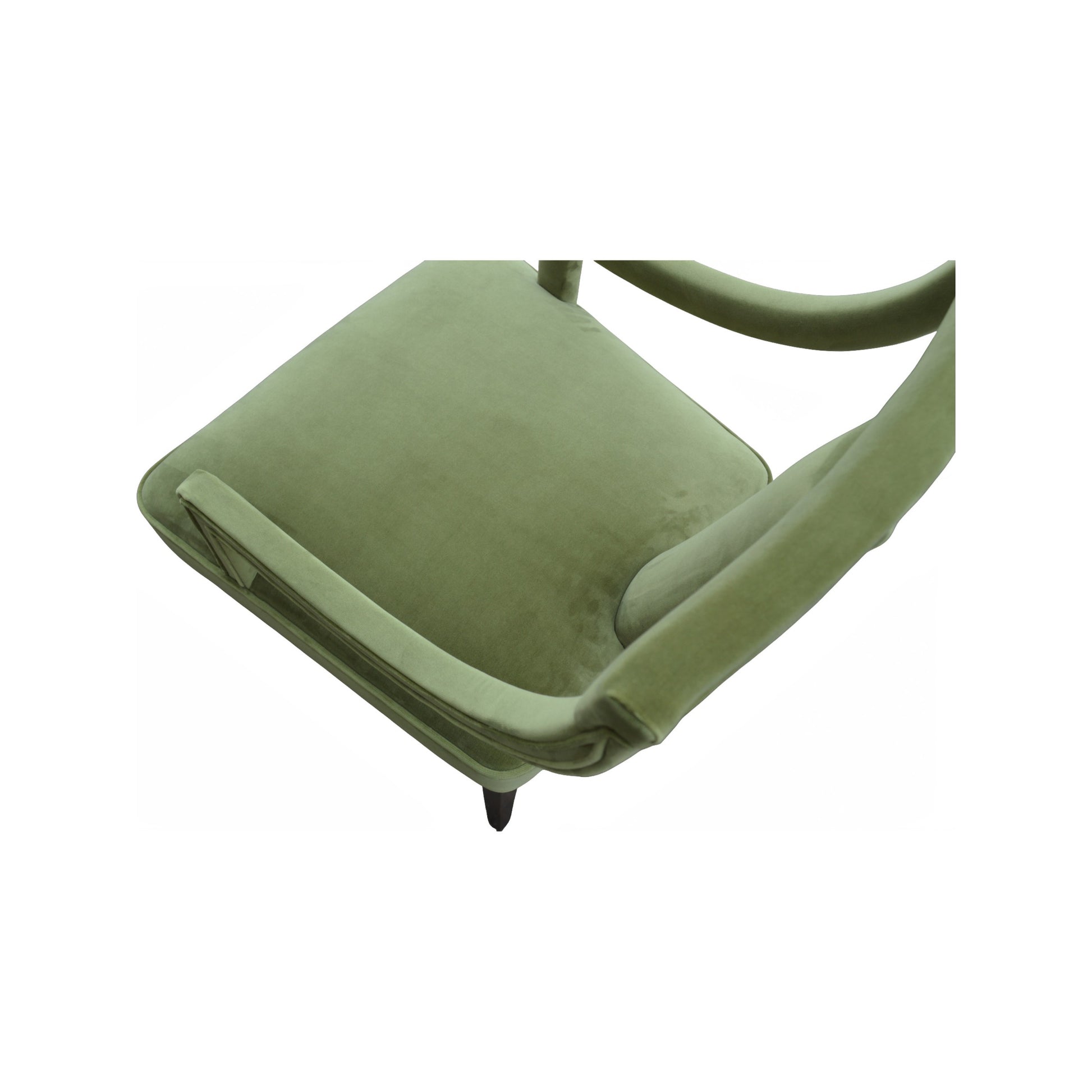 Arm chair upholstered in green velvet with curved arms on a birch frame