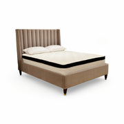 Upholstered queen bed in mushroom velvet with a channeled headboard.