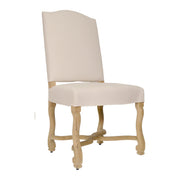 Dining chair with a carved oak frame and tailored linen upholstery