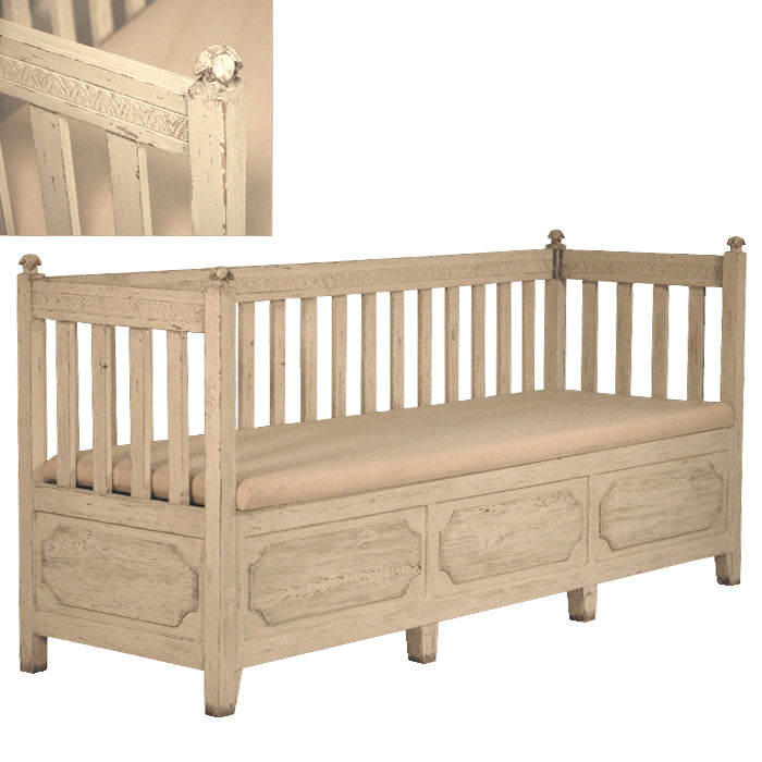 Painted Gustavian slat-back bench with an upholstered seat.