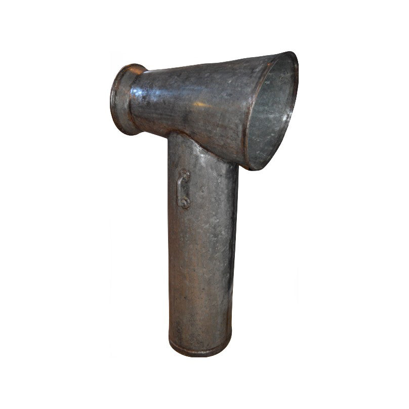 Large weathered iron air vent with a flared outlet and cylindrical body