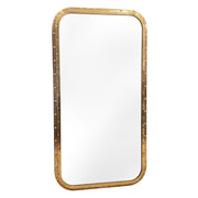 Large mirror set in an elongated salvaged brass ship porthole