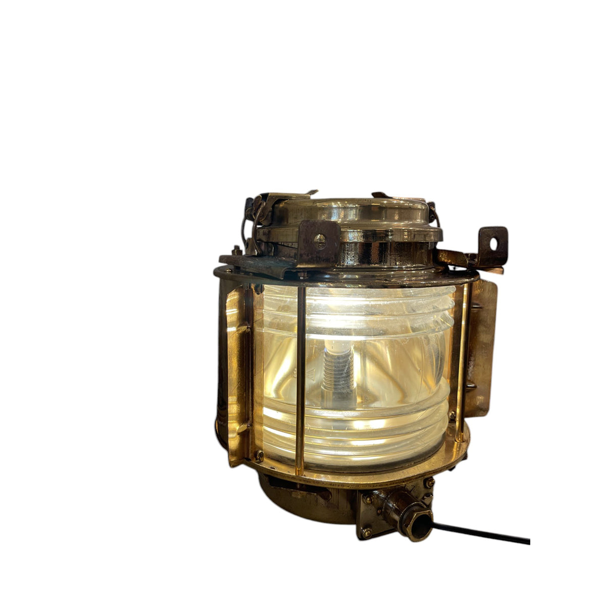 Salvaged brass marine bulls eye light with thick lens