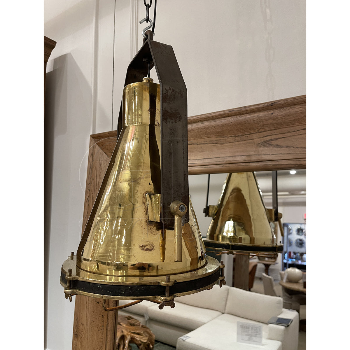 Salvaged brass marine hanging light with protective cage