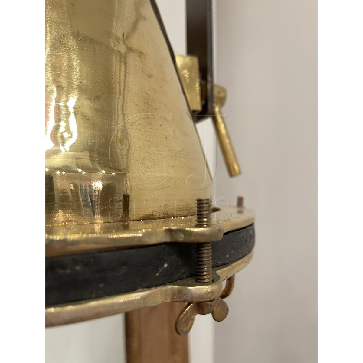 Salvaged brass marine hanging light with protective cage
