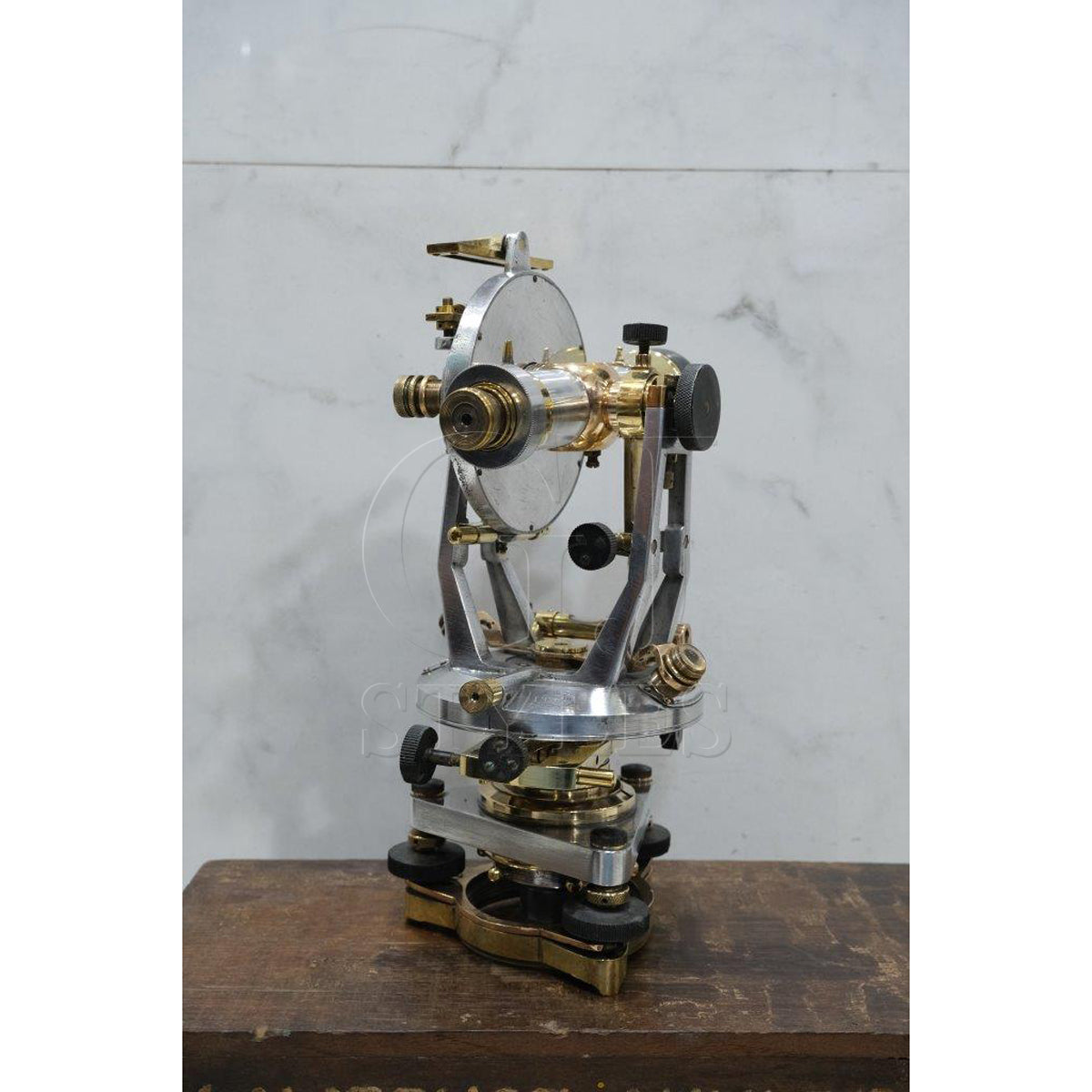 Salvaged aluminum and brass maritime instrument with patina