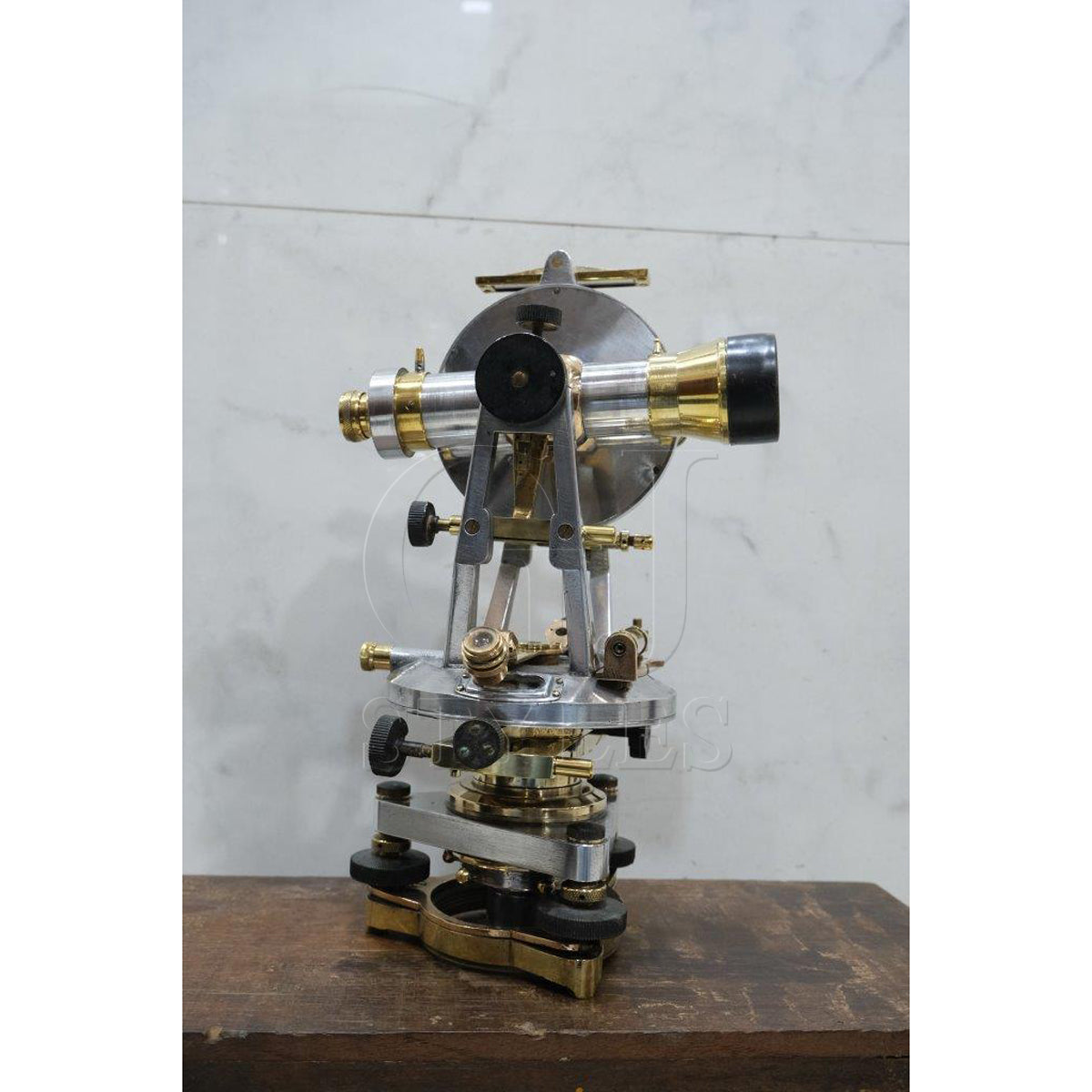 Salvaged aluminum and brass maritime instrument with patina