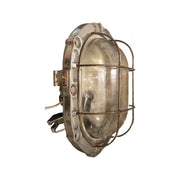 Salvaged extra large oval marine bulkhead light with iron cage