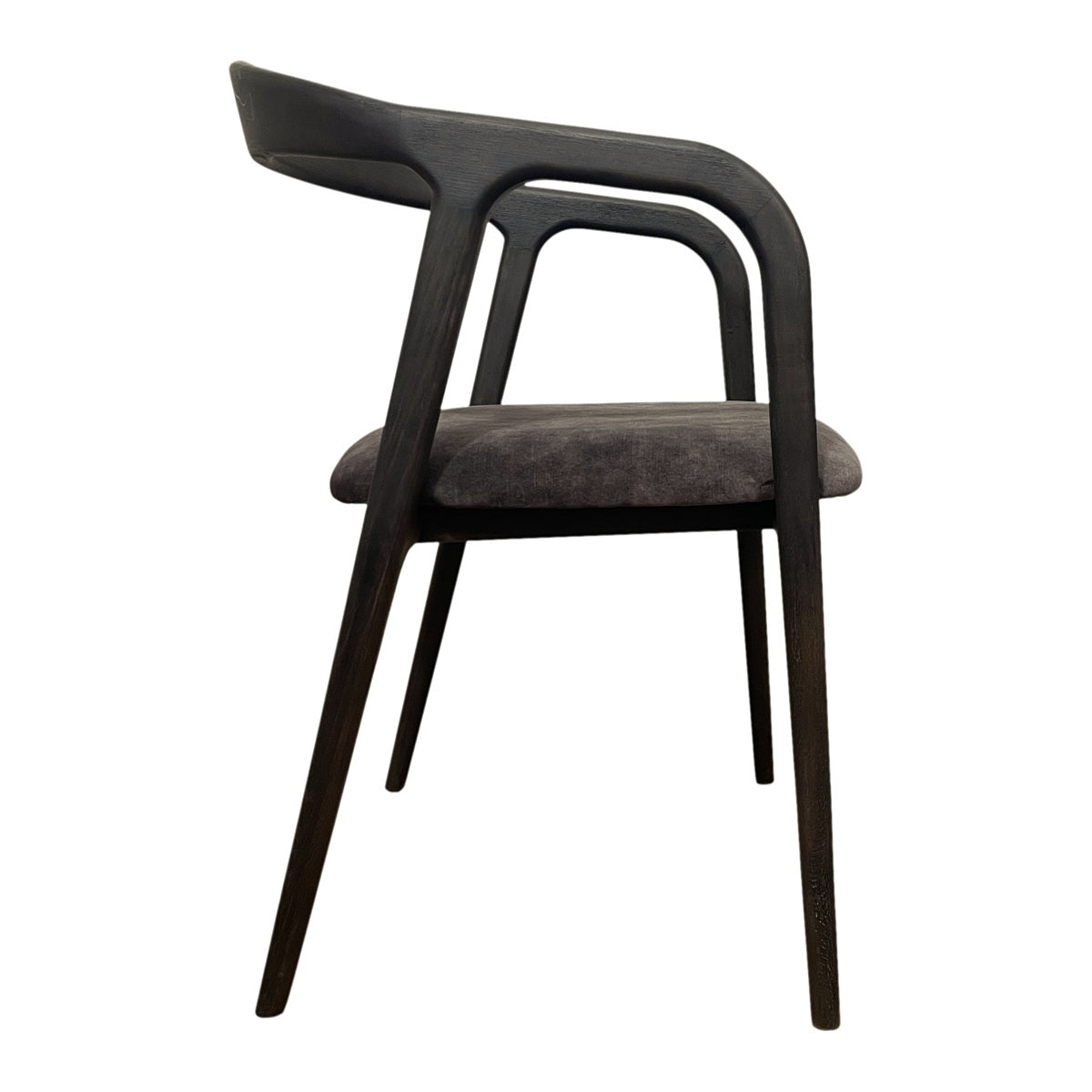 Modern armchair with a continuous birch frame and integrated arms in dark grey