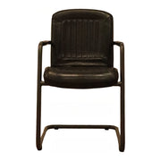 Black leather dining armchair on a cantilevered steel frame
