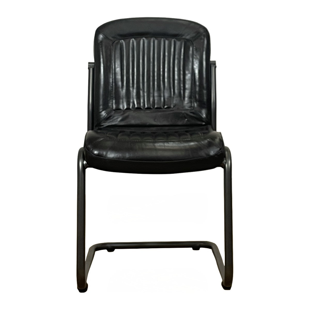 Black leather side chair with a channeled back on a cantilevered steel frame