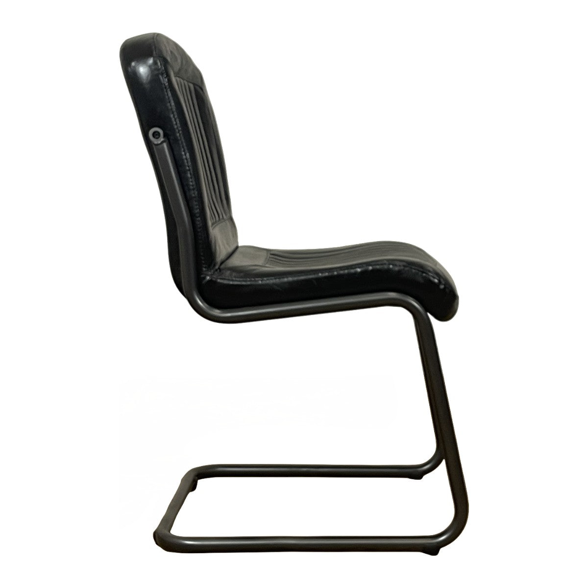 Black leather side chair with a channeled back on a cantilevered steel frame
