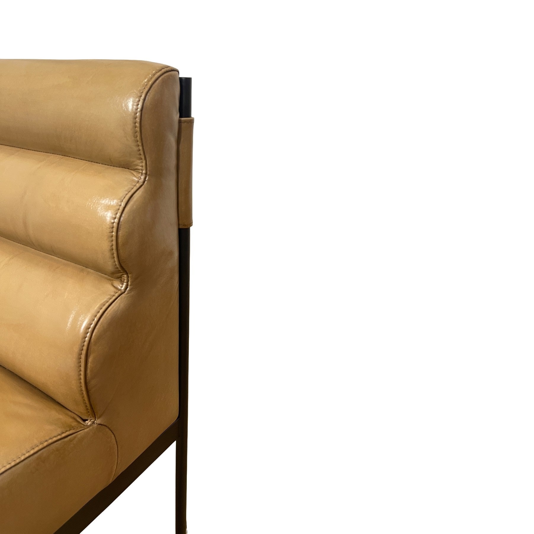 Camel leather dining chair with layered back cushioning on a steel base