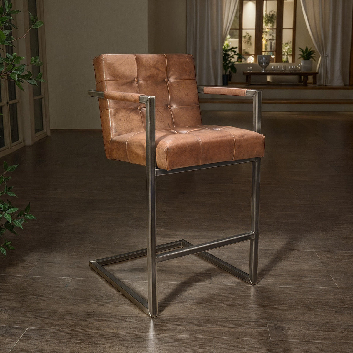 Cantilevered barstool in light brown buffalo leather with a minimalist frame