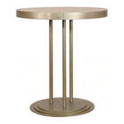 Round bistro table with smooth top on a slender antique brass base