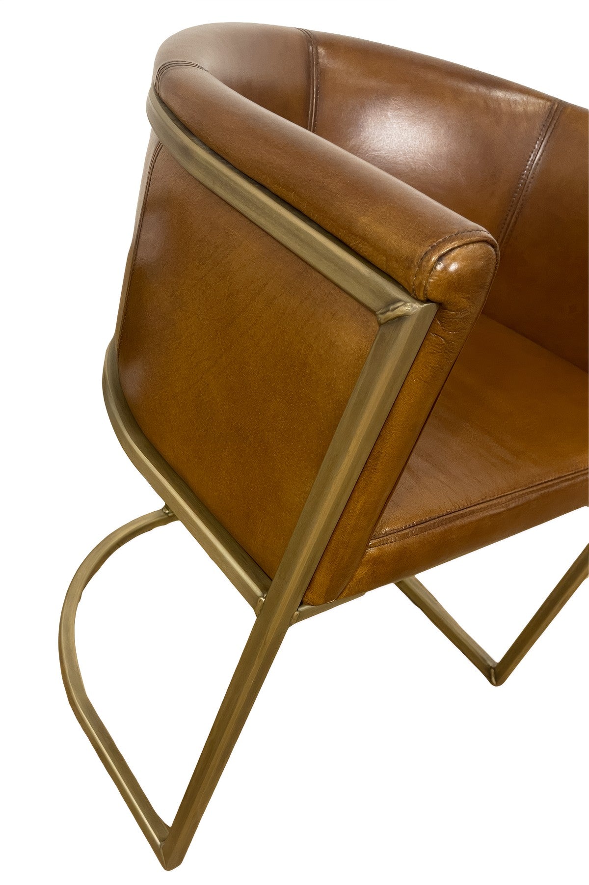Armchair with sculpted brown leather upholstery on a continuous brass frame