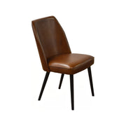 Dining chair in light brown buffalo leather with an upright profile