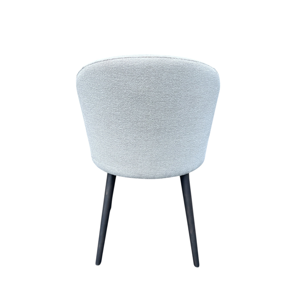 Compact dining chair in linen with a softly rounded back on a birch frame