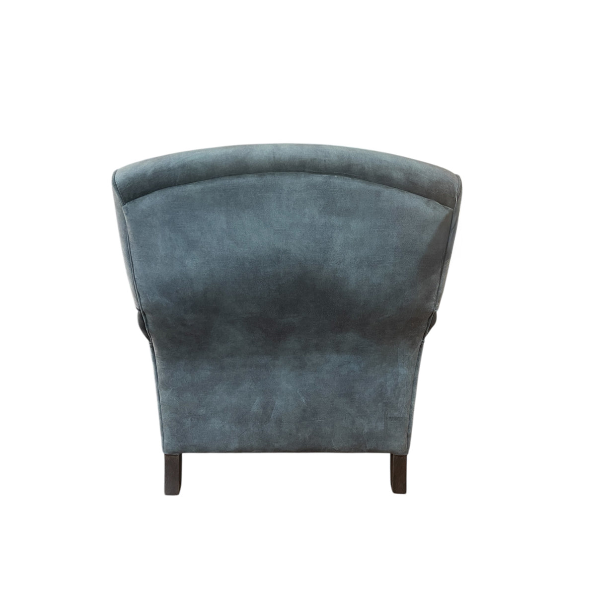 Deep lounge armchair upholstered in hunter green