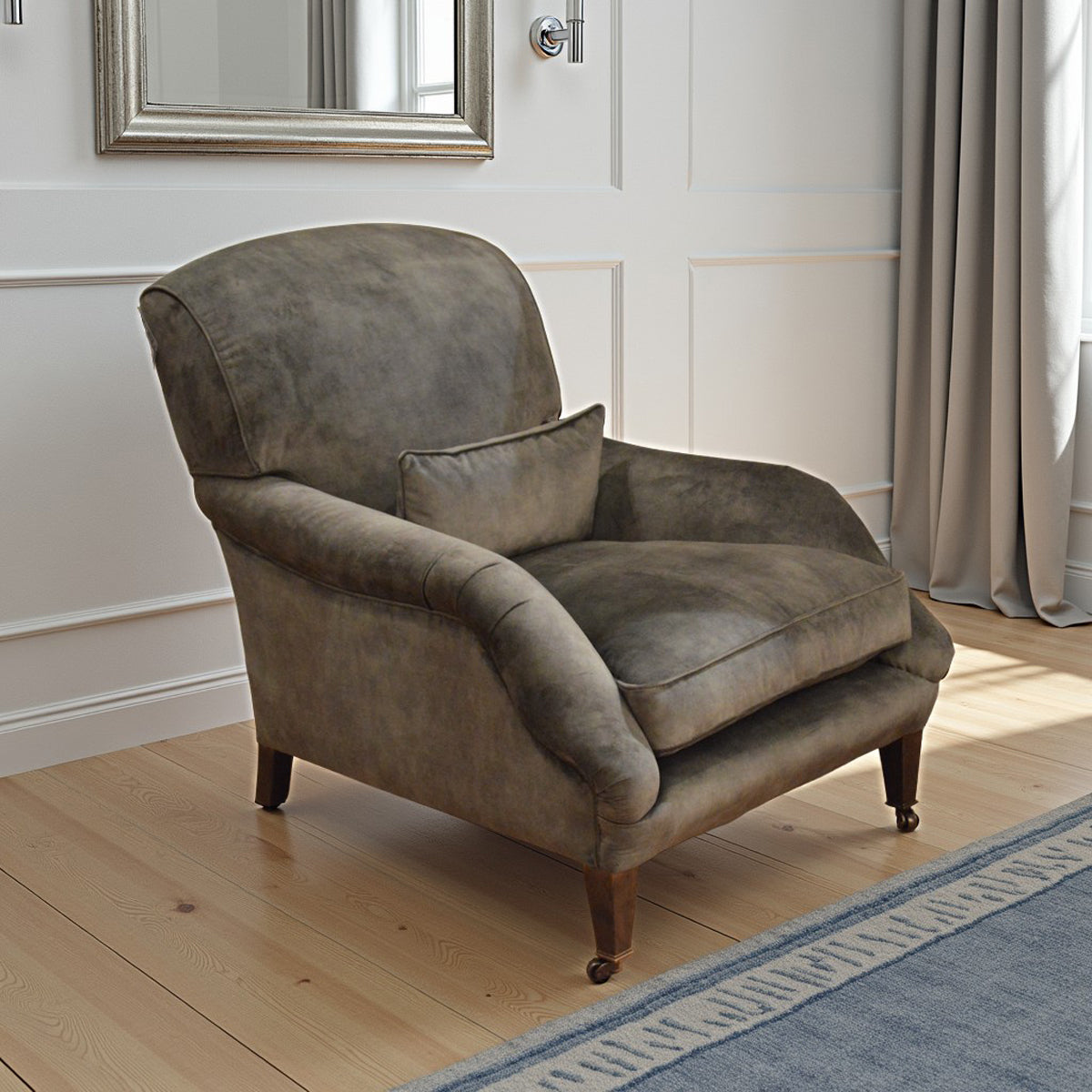 Deep lounge armchair upholstered in hunter green