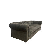 Whittington sofa in deep green Adore Hunter velvet with rolled arms and wood legs