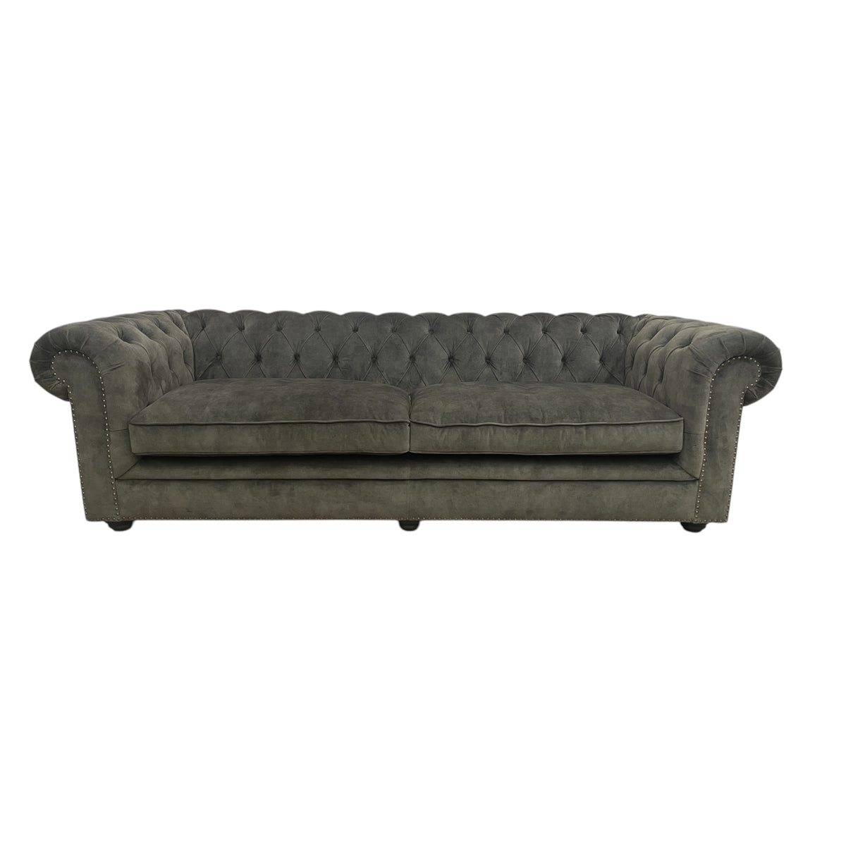 Whittington sofa in deep green Adore Hunter velvet with rolled arms and wood legs