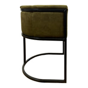 Compact armchair upholstered in moss green on a continuous steel frame