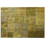 Vintage Turkish patchwork rug in softened yellow wool tones.