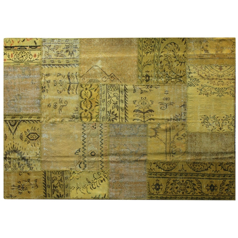 Vintage Turkish patchwork rug in softened yellow wool tones.